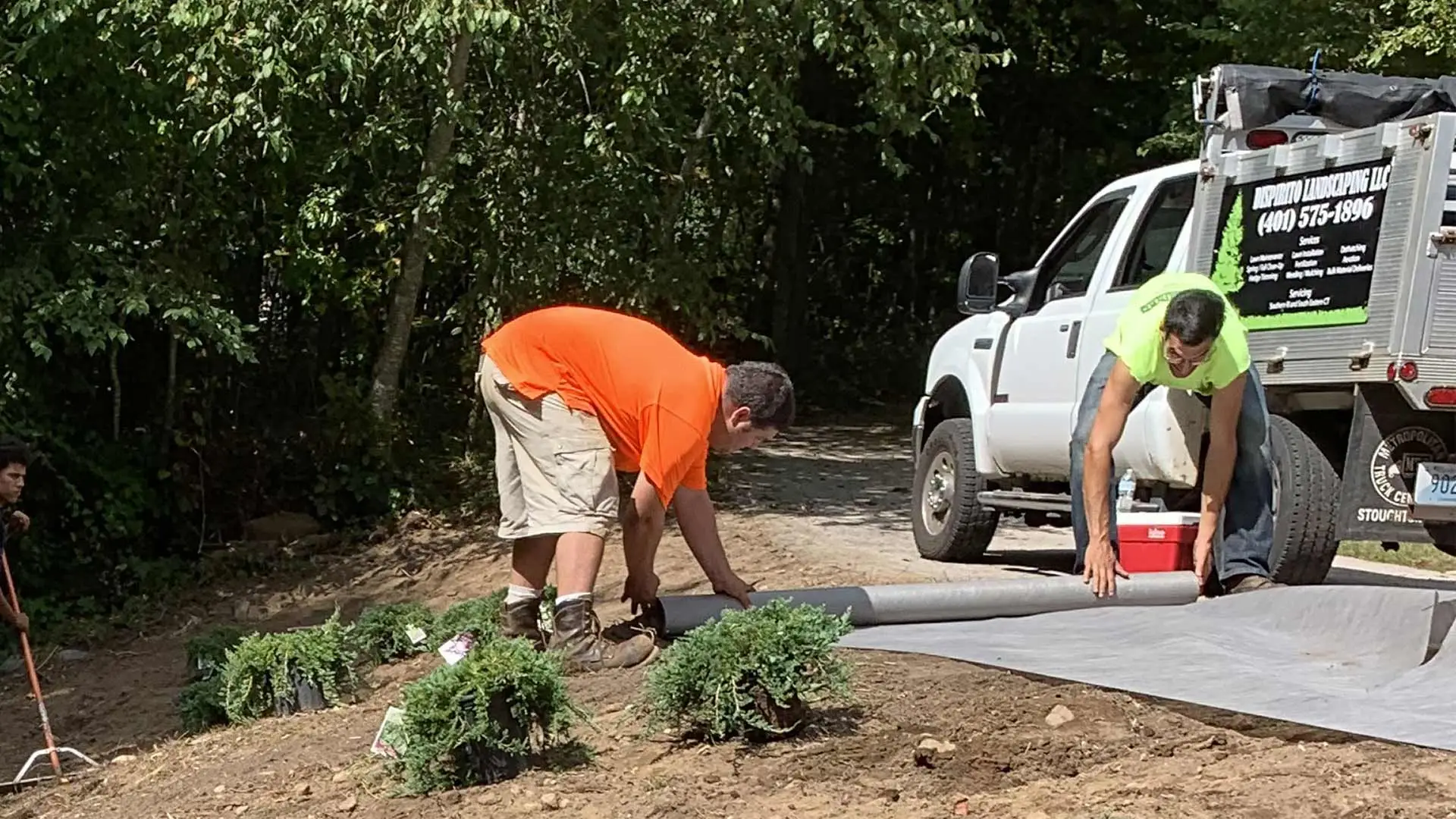 DiSpirito Landscaping LLC employees working on landscaping projects in Westerly, RI.